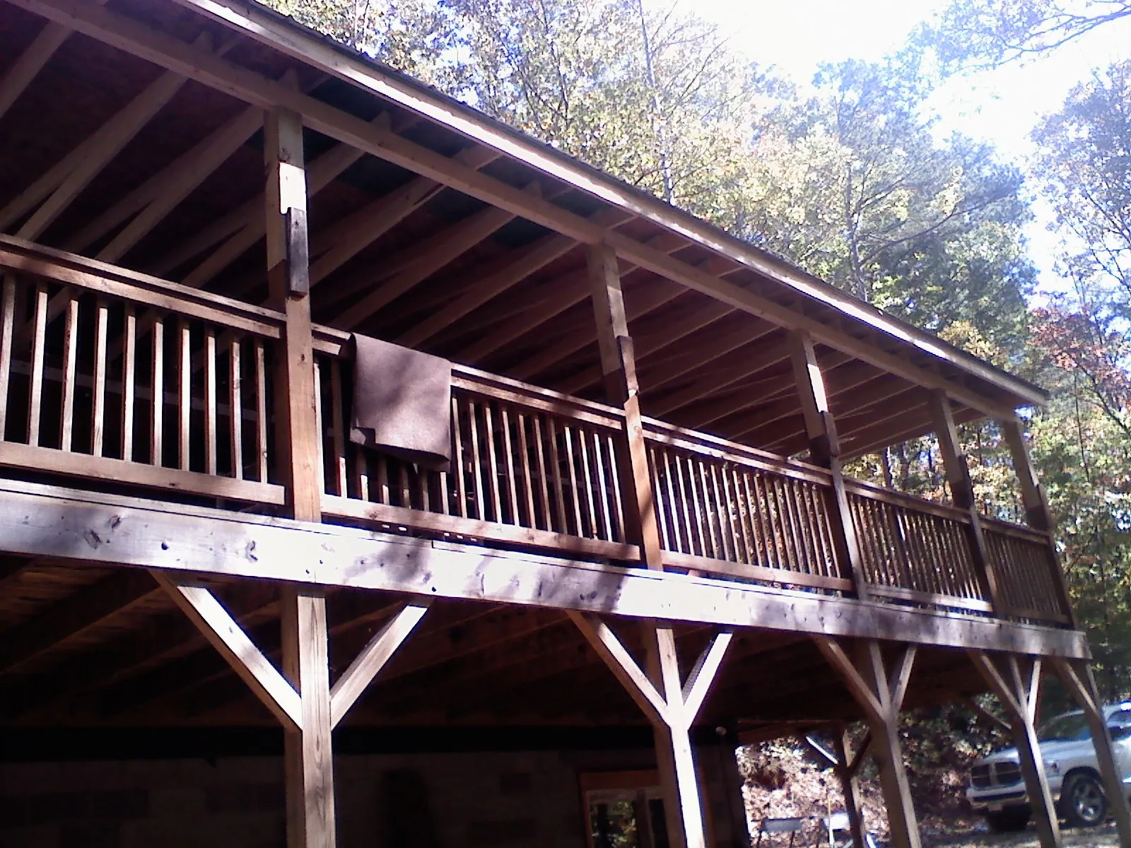 Timber framing under a new elevated porch and deck — Roof Leak Repair in Findlay by Roofing Brothers
